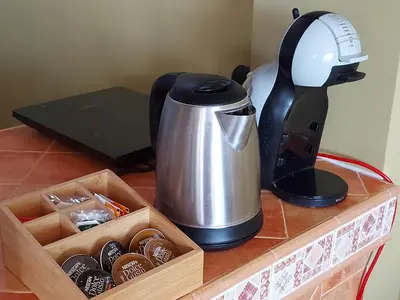 a coffee maker sitting on a counter next to a tea kettle at Posada la Toscana in Montroy