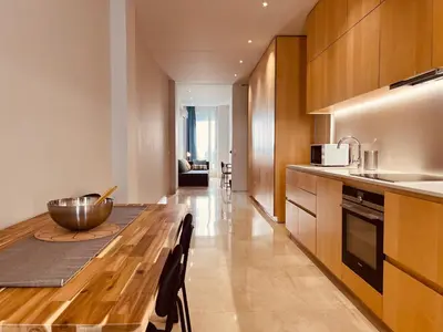 a kitchen with a wooden table with a bowl on it at BET Apartments - Central Market Apartments in Valencia