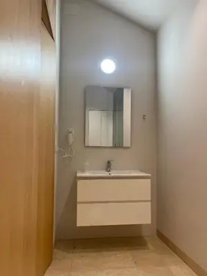 a bathroom with a sink and a mirror at BET Apartments - Central Market Apartments in Valencia