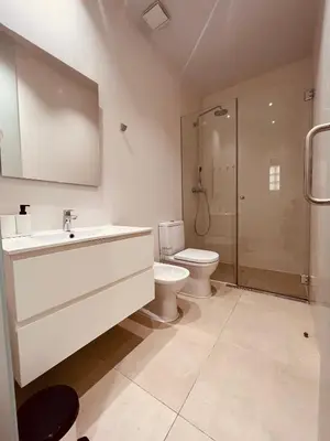 a bathroom with a toilet and a sink and a shower at BET Apartments - Central Market Apartments in Valencia