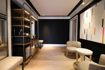 a living room with chairs and a fireplace at ESTIMAR Valencia in Valencia