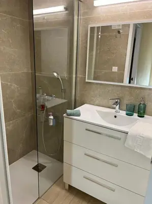 a bathroom with a shower and a sink at Modern apartment in Valencia, Port Saplaya, by the sea in Port Saplaya