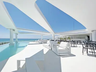 an open living room with a view of the ocean at Global Vacacional, Nuevo apartamento con terraza en Gran Canet Residencial in Canet de Berenguer