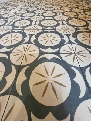 a tile floor with a pattern on it at Lounge garden sea relax in Valencia