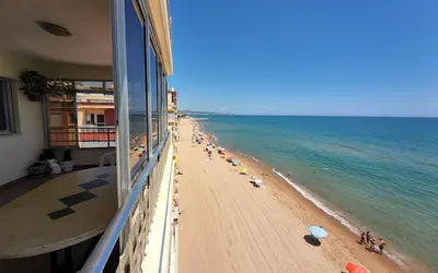 a view of a beach from a building at Tavernes de Valldigna Chez Svetlana in El Brosquil