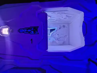 an open white microwave with a blue light at CAPSULE INN VALENCIA Hostel in Valencia
