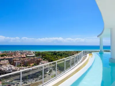 a view of the ocean from the balcony of a resort at Apartment Gran Canet by Interhome in Canet de Berenguer