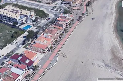 an aerial view of a beach with houses and a street at Confortable Beach Appartment with Views to the Sea in Puzol