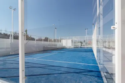 a tennis court with a net on it at Gran Apartment in Canet de Berenguer