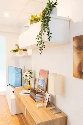 a room with a desk with a computer on it at Fantastic apartment near beach & Science City in Valencia