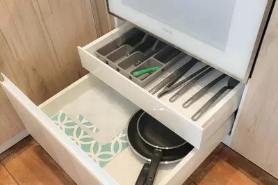 a drawer in a kitchen with utensils in it at Apartamentos Las Ciencias J in Valencia