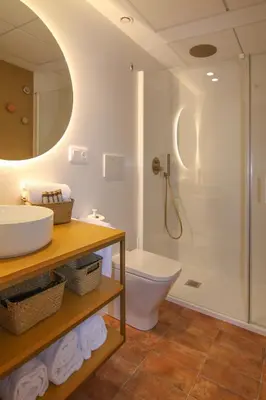 a bathroom with a toilet and a sink and a shower at Apartamentos Las Ciencias Studio M in Valencia