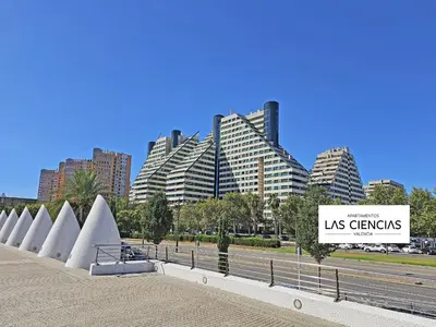 a sign in front of a city with tall buildings at Apartamentos Las Ciencias Studio M in Valencia