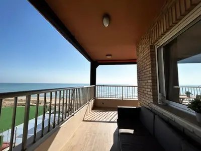 a balcony with a view of the ocean at Mareny de Barraquetes in Mareny Blau