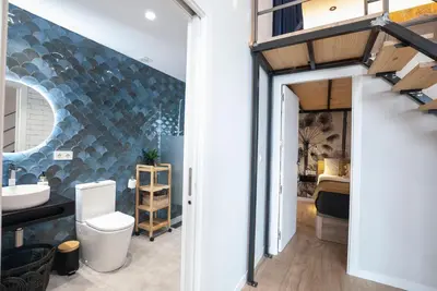a bathroom with a toilet and a sink at Precioso Loft en Valencia in Valencia