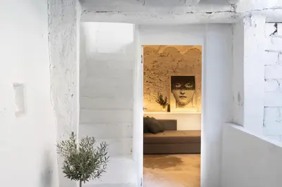 a white room with a white brick wall at Casa cristo 37 navarrés in Navarrés