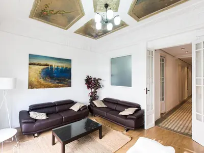 a living room with a couch and a table at Total Valencia Terrace in Valencia