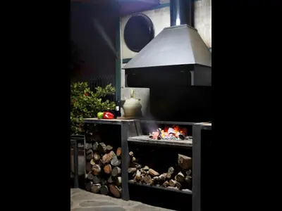 a grill with a fire inside of it at Holiday Home Valencia in Riba-Roja De Turia