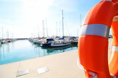 a group of boats docked in a marina at Global Vacacional, Apartamento con piscina y terraza en Canet in Canet de Berenguer