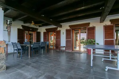 a dining room with a table and chairs at La Traviesa,Villa de Lujo de 500 m. en el Campo con Piscina in Campo Arcís