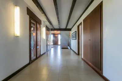 a hallway of an office building with a hallwayngth at La Traviesa,Villa de Lujo de 500 m. en el Campo con Piscina in Campo Arcís