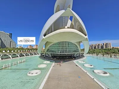 a large building with a pool in the water at Apartamentos Las Ciencias Studio Q in Valencia