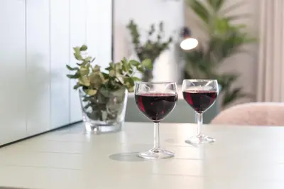 two glasses of red wine sitting on a table at Moontels Mercado de Ruzafa in Valencia
