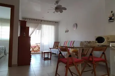 a kitchen and living room with a table and chairs at Precioso apartamento en Canet d,en Berenger in Canet de Berenguer