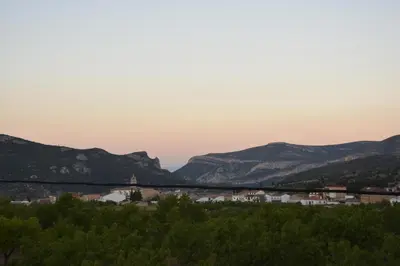a view of a town with mountains in the background at El Pino B & B, Chera in Valencia