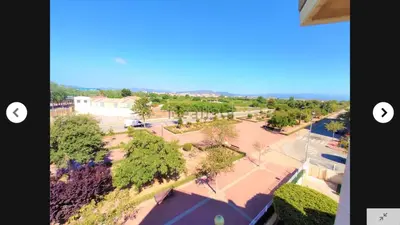 an overhead view of a park with trees and a street at CANET PLAYA MAGNIFICO APTO FAMILIAR con PISCINA y GARAJE in Canet de Berenguer