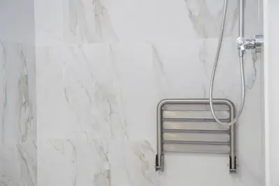 a shower with a metal ladder in a bathroom at Casa Rural Sarsalet in Chella