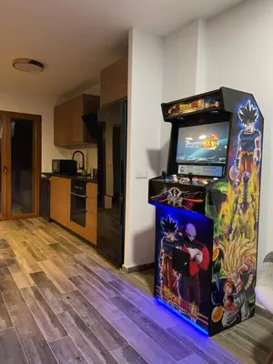 a video game in a living room with a video game machine at Casa Rural Sarsalet in Chella