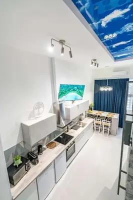 a kitchen with a sink and a counter top at Fantastic Loft with an exquisite design in Valencia