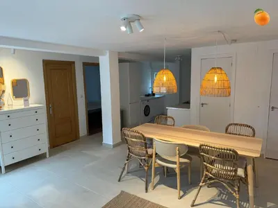 a kitchen and dining room with a table and chairs at Fully private villa for 12p with large pool in Valencia-Náquera in Náquera