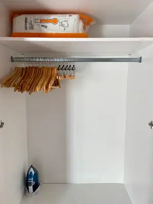 a closet with white walls and white cabinets at RIZADA RUZAFA in Valencia