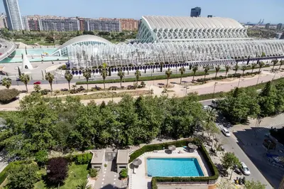 an aerial view of a park with a pool and a building at Travel Hábitat L'Umbracle in Valencia