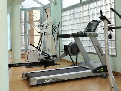 a room with a gym with a treadmill at Travel Hábitat L'Umbracle in Valencia