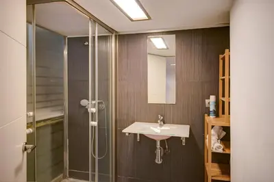 an open door with two chairs on a balcony at Apartamento REPESO in Valencia