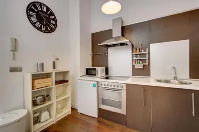 an overhead view of a kitchen and a dining room at Apartamento REPESO in Valencia