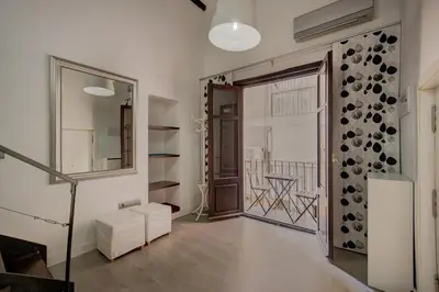 a living room with a couch and a tv at Apartamento REPESO in Valencia