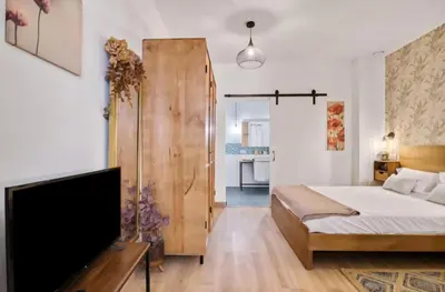 a small kitchen with a stove in a room at URBAN LOFT VALENCIA in Valencia