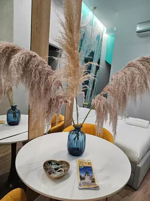 a room with two tables with vases on them at Lounge garden sea mint fresh in Valencia