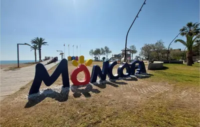 a sign that says mongolia in a park at 2 Bedroom Nice Apartment In Moncofa in Moncófar
