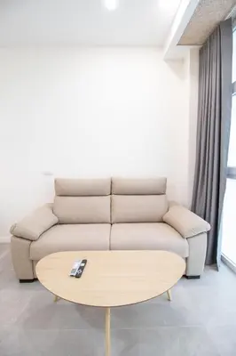 a living room with a couch and a coffee table at Favara Flats by Concept in Valencia