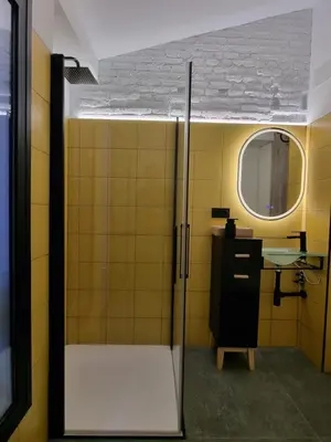 a bathroom with a sink and a mirror at cactus loft Ruzafa in Valencia