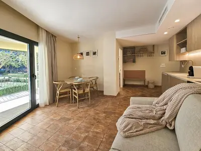 a living room with a couch and a table at Apartamentos Las Ciencias Studio Y in Valencia