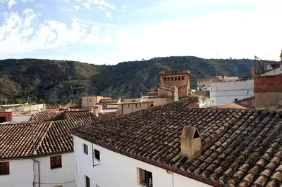 a view of a city with roofs of buildings at Casa rural para 8 huéspedes en plena naturaleza in Gestalgar