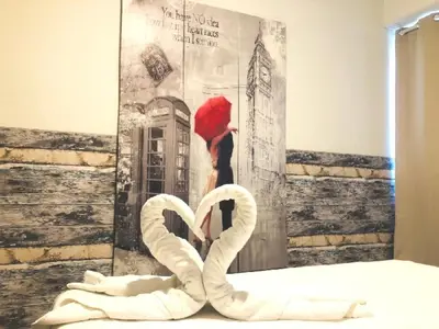 a room with two swans in front of a painting at VALENCIA SUITS YOU Centro Histórico, Establecimiento Automatizado-Fast Auto Check in&Out, Solo para Adultos-Adults only in Valencia