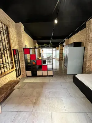 a room with a room with a couch and a room with a room at IY Loft 4 - Open Plan Garage Style - Up to 4 people in Valencia