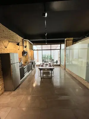 a kitchen with a table and a dining room at IY Loft 4 - Open Plan Garage Style - Up to 4 people in Valencia